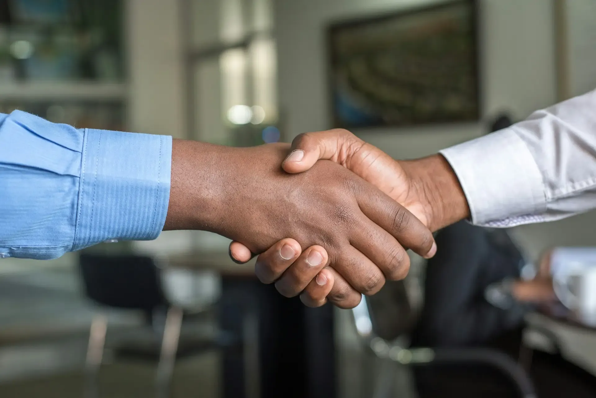 Business partnership handshake